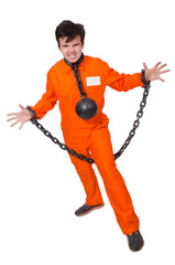 Young inmate with chains isolated on the white