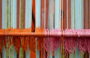 wool weavings of many colors in the old textile loom