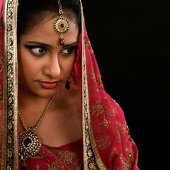 Wall Mural - Indian girl looking at side space