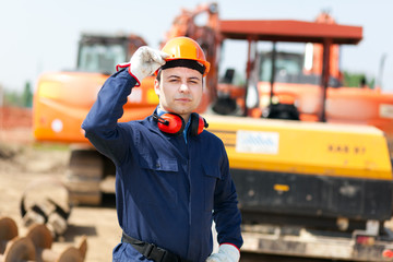 Wall Mural - Portrait of worker in a construction site