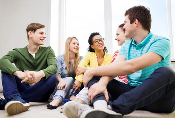 Sticker - five smiling teenagers having fun at home