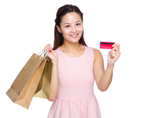 Wall Mural - Asian woman with shopping bag and credit card