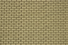 Wall Made Of Decorative Grey Bricks With Dark Seams