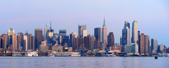 Wall Mural - Urban City skyline panorama at dusk