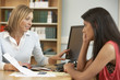 © Monkey Business - College tutor with student