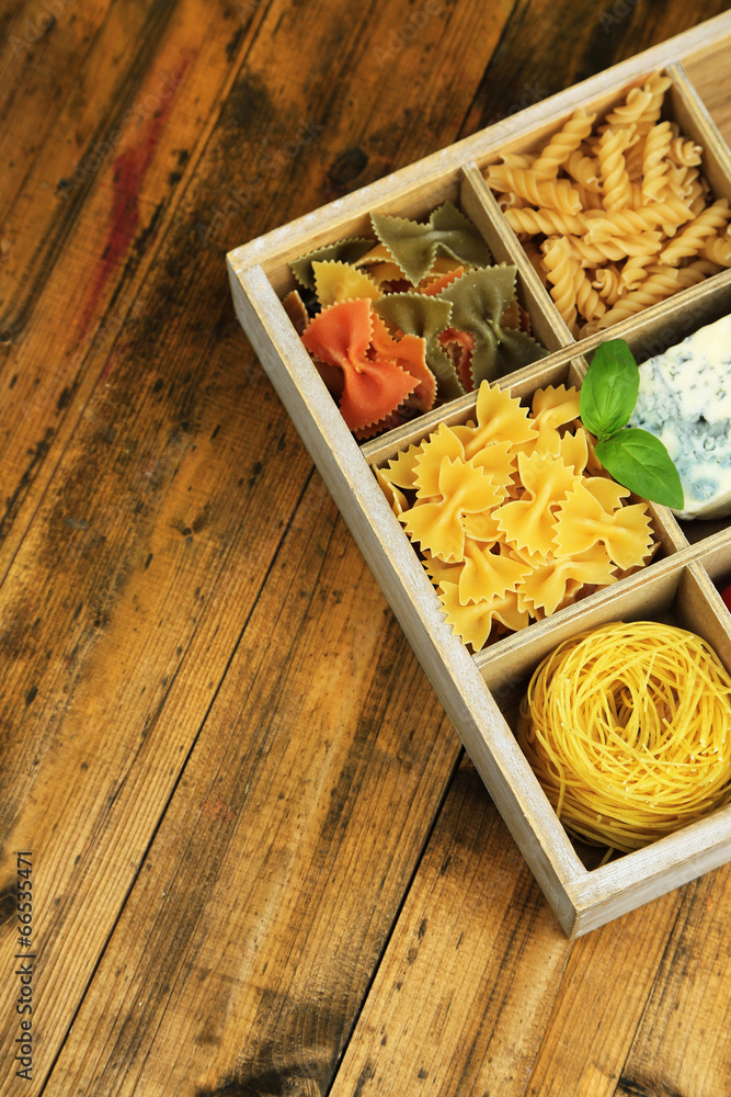 Italian products in wooden box on table close-up
