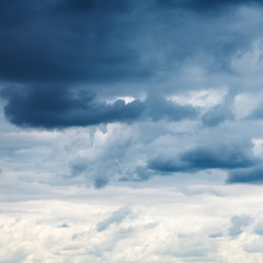 Wall Mural - dark blue rainy clouds in overcast sky