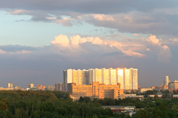 Poster - apartment house lit by sunset light in summer