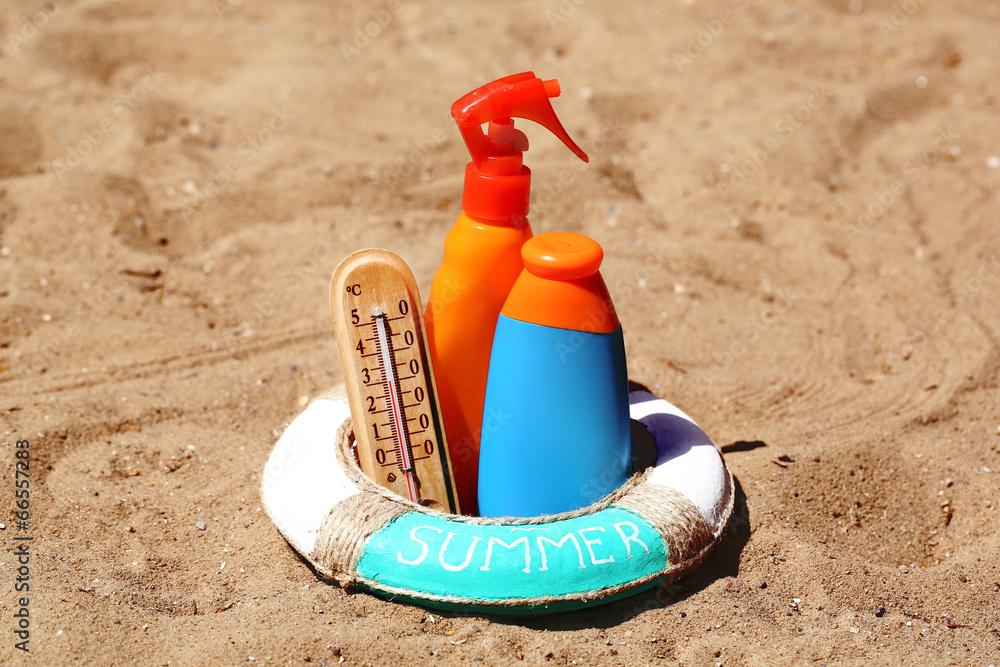 Thermometer in sand close-up