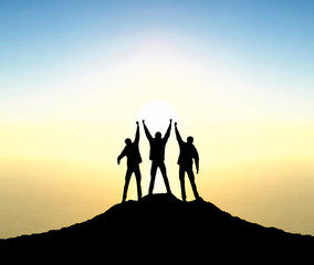 Wall Mural - champions on mountain peak. sport and active life concept
