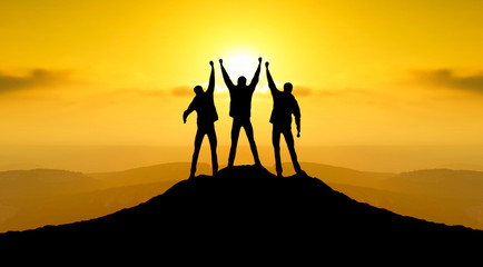 Wall Mural - champions on mountain peak. sport and active life concept