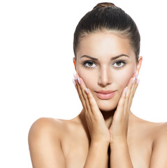 Wall Mural - face of young woman with clean fresh skin over white