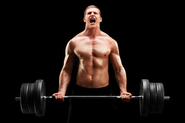 Poster - Young man lifting a heavy weight