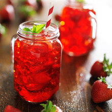 Strawberry Cocktail In Jar With Deep Red Color