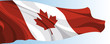 The national flag of the Canada on a background of blue sky
