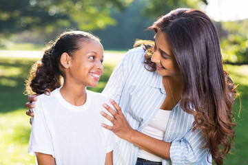 indian mother talking to daughter