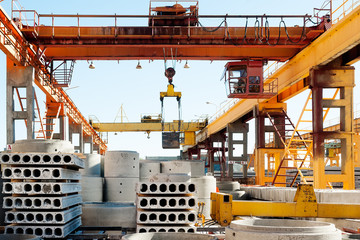 Crane operator works at finished goods warehouse