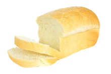 Loaf Of Bread With Think Cut Slices Isolated On White