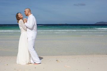 Beautiful love couple on the beach