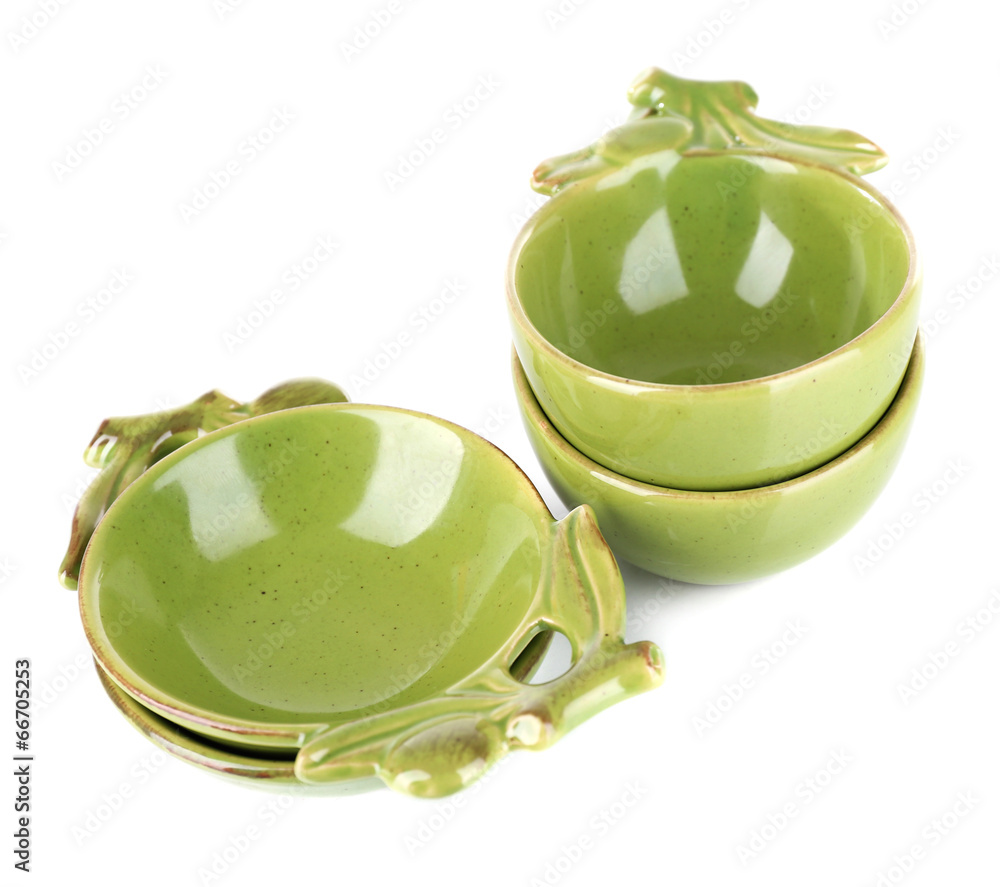 Green empty bowls for olive oil and olives  isolated on white