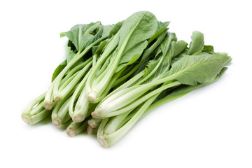 choy sum vegetable pile on white background