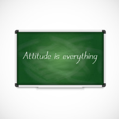 Attitude is Everything. Text on a chalkboard.