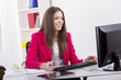 © BGStock72 - Young woman in the office