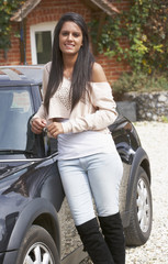 Wall Mural - Young woman with car