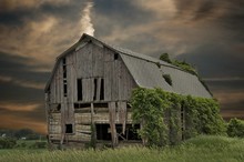 Dilapidated Barn With Sunset Sky