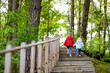 © MNStudio - Two little sisters walking up stairs