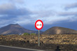 © travelview - Landscape with a traffic sign: Don't overtake