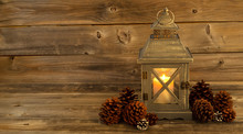 Traditional Asian Lantern Glowing Brightly With Natural Pine Con