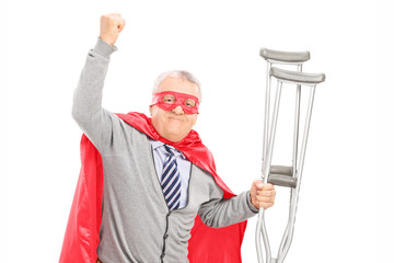 Sticker - Superhero with crutches gesturing happiness