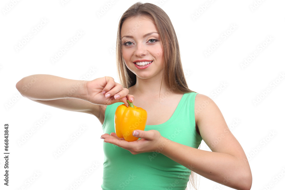 Beautiful girl with yellow pepper, isolated on white