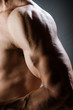 © Elnur - Muscular man posing in dark studio