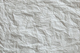 Fototapeta Dmuchawce - Crumpled paper texture