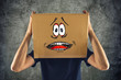© Bits and Splits - Man with cardboard box on his head and terrified look skethed