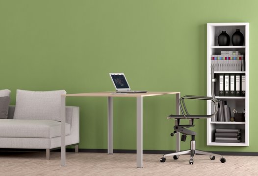 grüner büroraum mit tisch und sofa