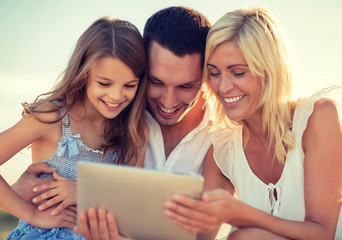 Canvas Print - happy family with tablet pc taking picture