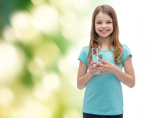 Poster - smiling little girl with glass of water