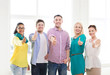 © Syda Productions - happy creative team showing thumbs up in office