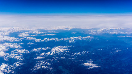 Canvas Print - Landscape of Mountain. view from the airplane window . height of