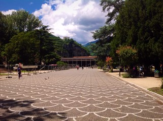 Wall Mural - panoramic view of train station and public gardens in Trento