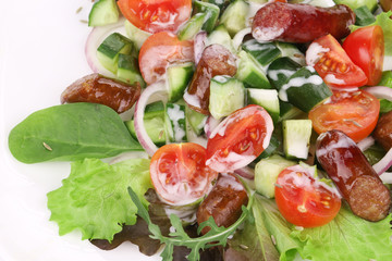 Sticker - Salad with sausages. Close up.