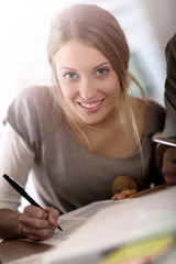 Aufkleber - Girl filling application form for business school