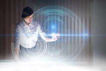 Poster - Composite image of redhead businesswoman using interactive desk