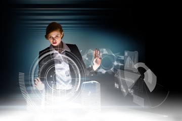 Poster - Composite image of redhead businesswoman using interactive desk