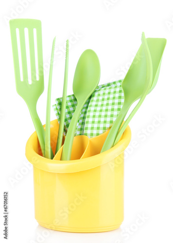 Board z aluminiowym obramowaniem Plastikowe naczynia kuchenne w kubek na białym tle