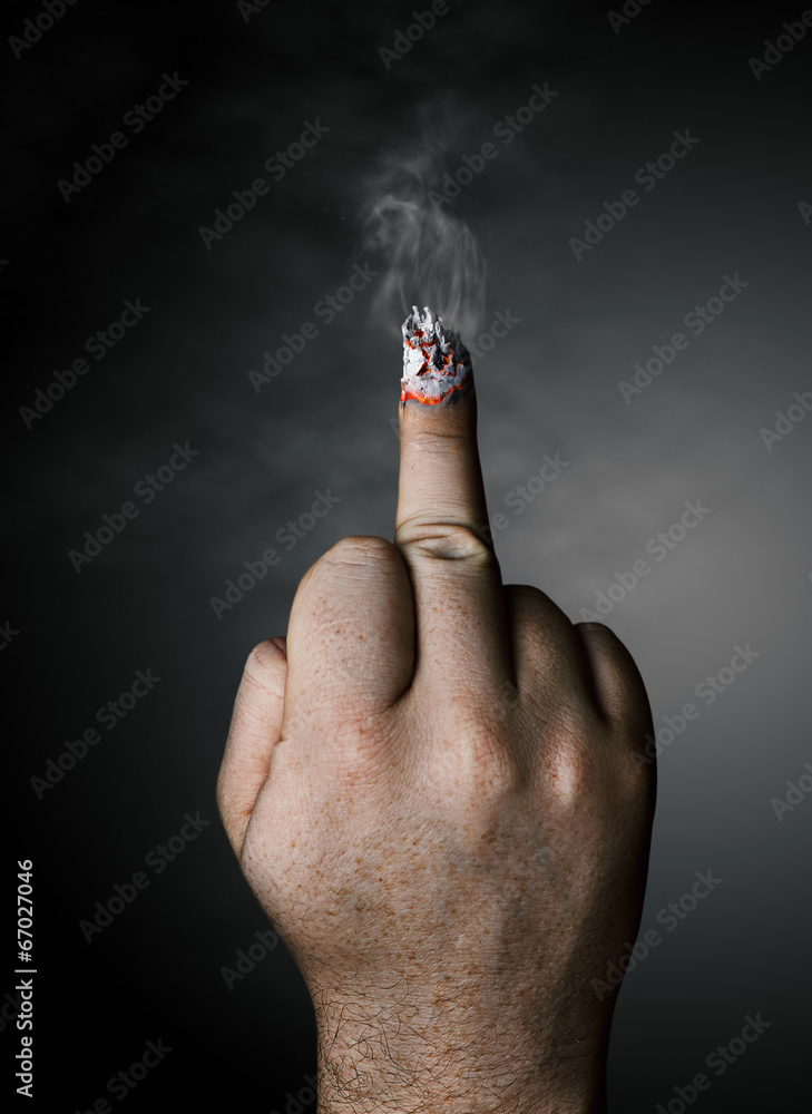cigarette fingers stop smoking concept. cigarette like a middle finger Stock Photo