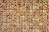Fototapeta Dinusie - Circle design on bricks of a brick wall
